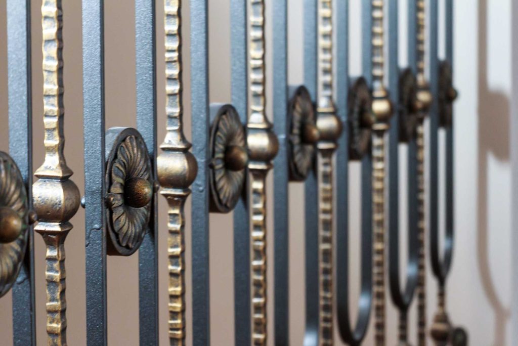 Close-up of a beautifully crafted metal fence for a residential property